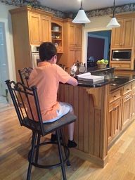 child-doing-homework-at-kitchen-island-e1407075287944.jpg