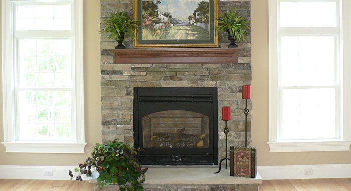 stone fireplace by raven homes